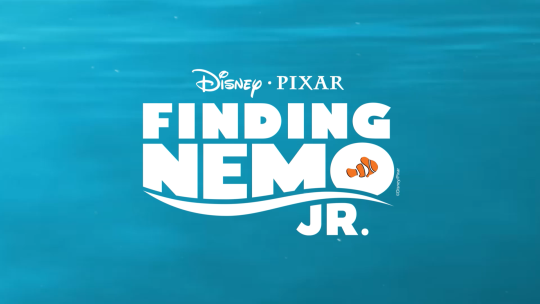 A backdrop of the ocean with the logo for Disney Pixar Finding Nemo JR