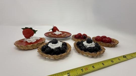 Strawberry, cherry, and blueberry fruit tarts