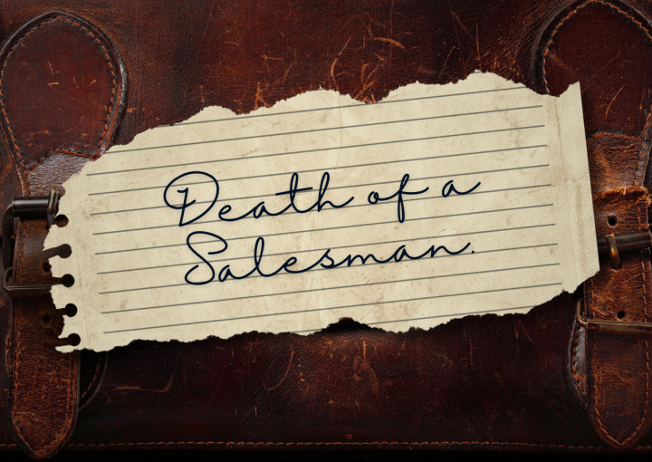 death of a salesman handwritten on a torn piece of paper sitting on an old brown leather briefcase